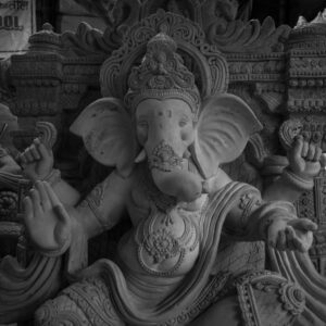 Monochrome photograph of a detailed Ganesha statue in Mumbai, India.